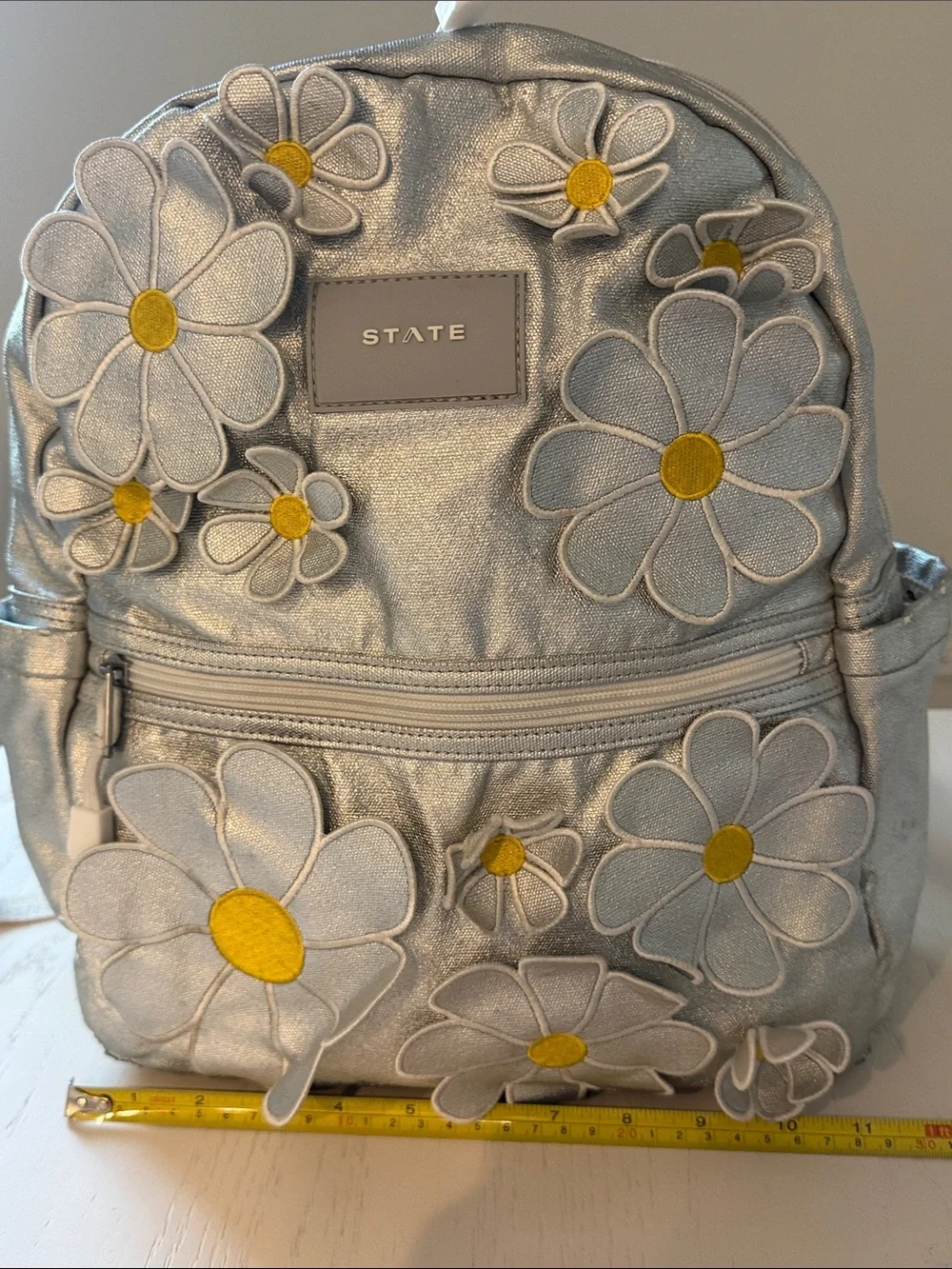 STATE Metallic Silver Daisy Patch Kane Kids Mini Backpack